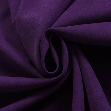 Ensfarvet mørkelilla gardin med øjer