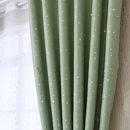 Grønt mørklægningsgardin med stjerner