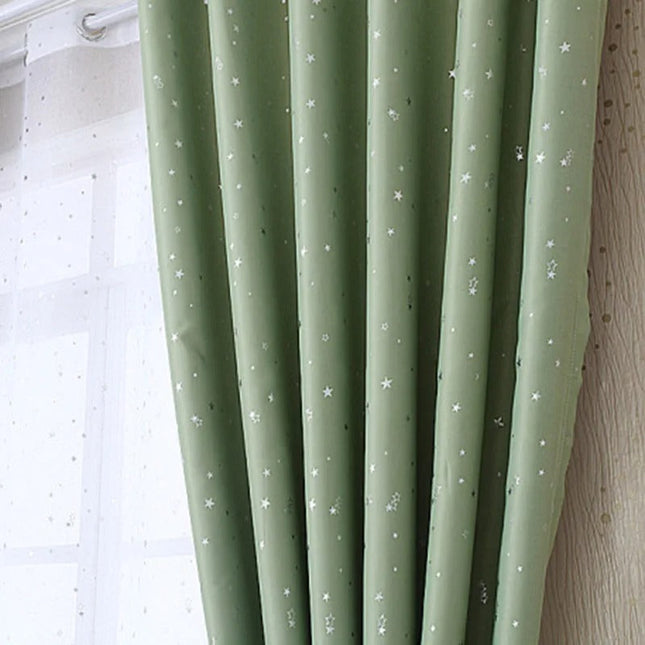 Grønt mørklægningsgardin med stjerner